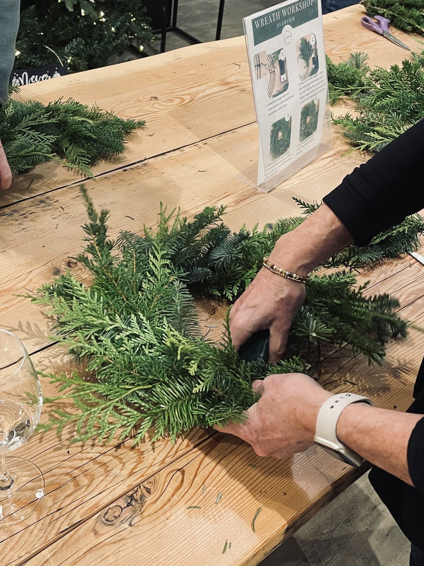 Poster for Holiday Wreath Workshop at Cannery Brewing