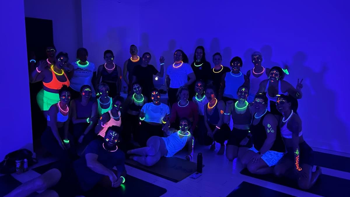Poster for BUTI After Dark: Halloween Glow Yoga Party